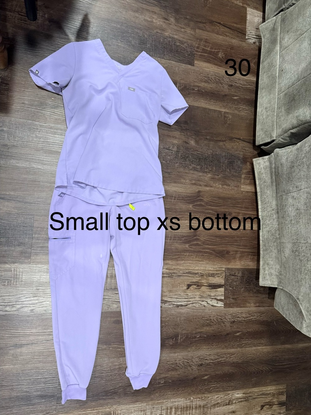 Women’s figs small top xs bottom bleach stain on pants
